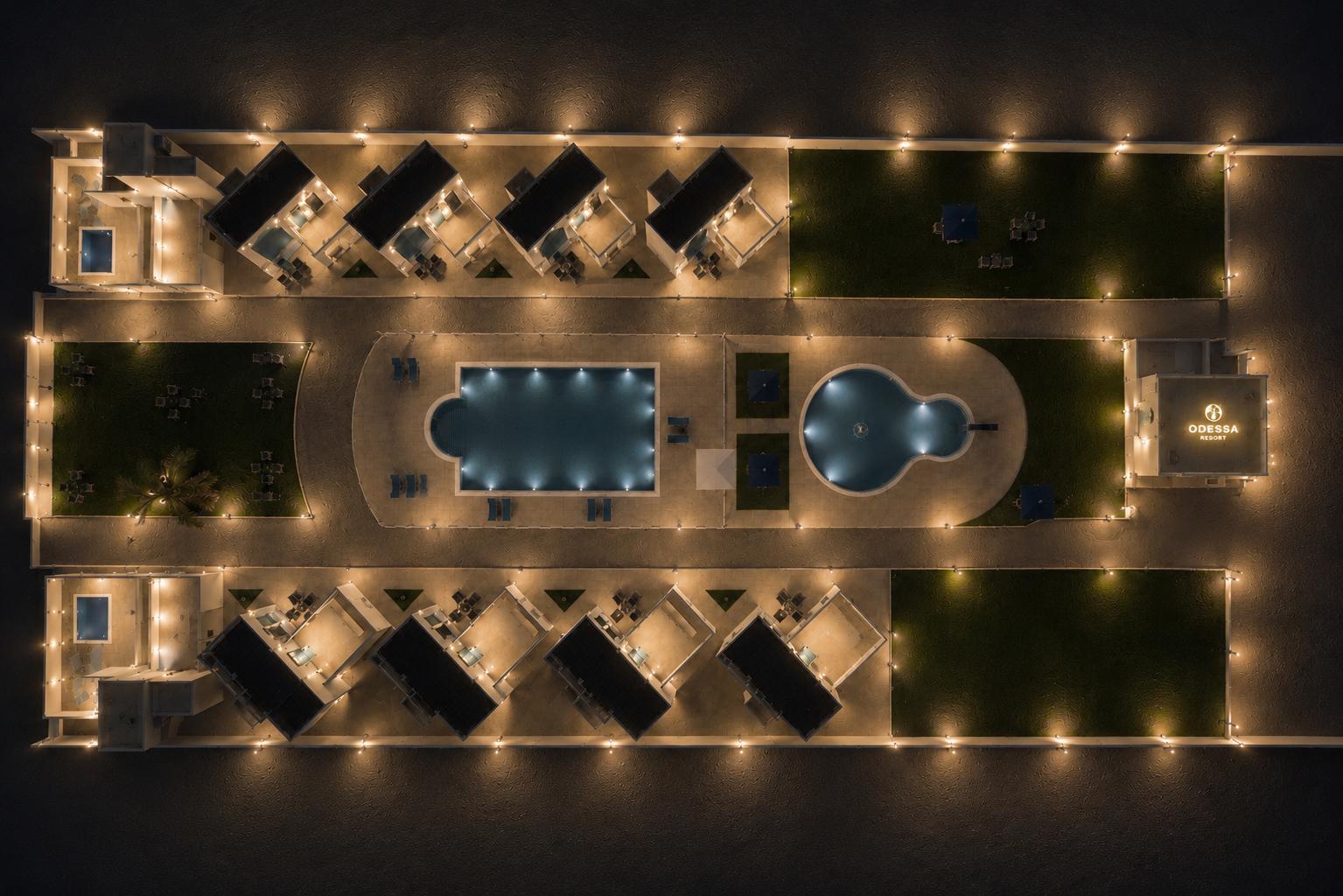 Aerial view of the two pools and villas
