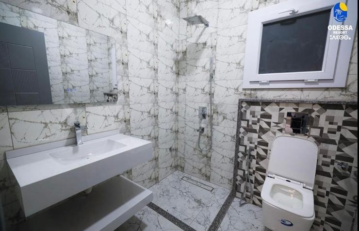 Marble bathroom with walk-in shower