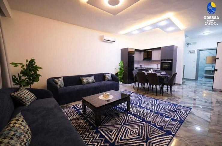 Villa B living room with open kitchen